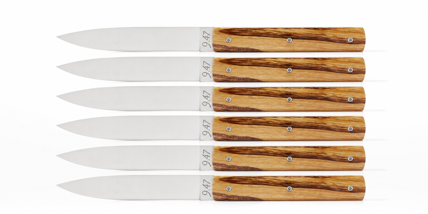 Couteau de table 9.47 avec manche en Bois de Serpent (Marmoroxylon racemosum), lame en acier inoxydable Sandvik 12C27M, fabriqué artisanalement à Thiers en France